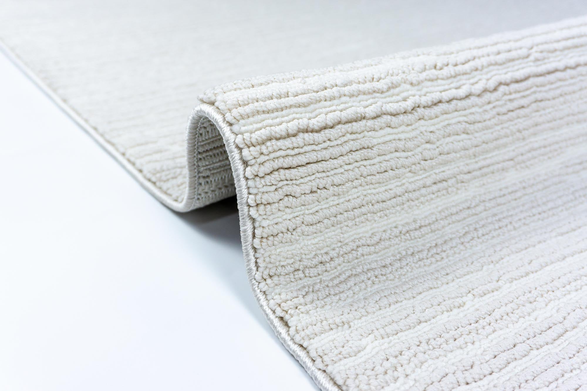 Nova 821 Bej Bukleli Yumuşak Kesme Halı